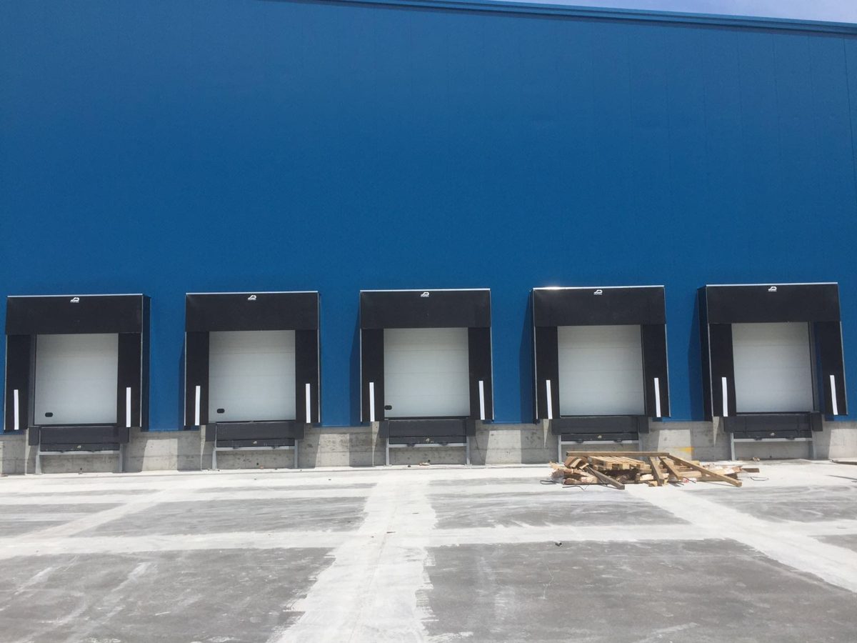 Commercial sectional overhead doors on a distribution building
