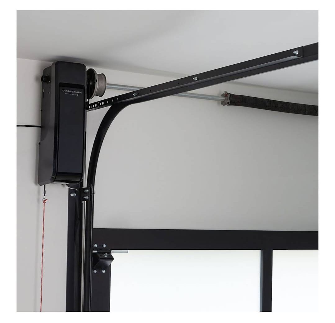 Wall-mount (jackshaft) opener — quiet, and frees the ceiling